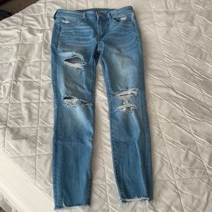 Hi-rise temp tech distressed jeans